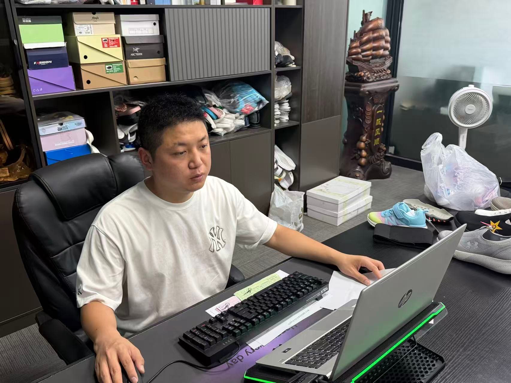 Footwear business manager reviewing project work at the office